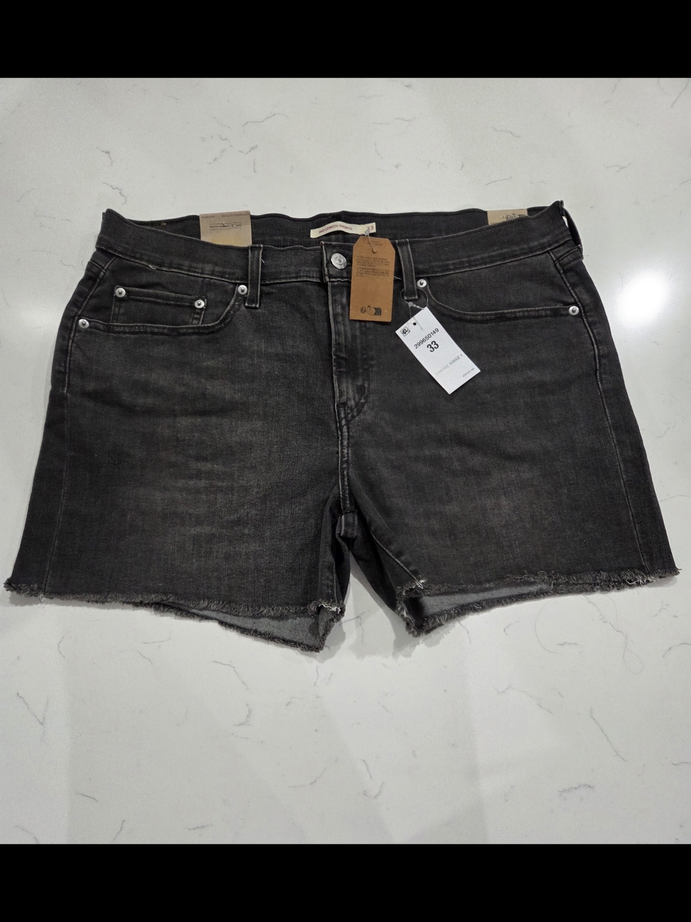 Levi's Washed Black Denim Cutoff Shorts